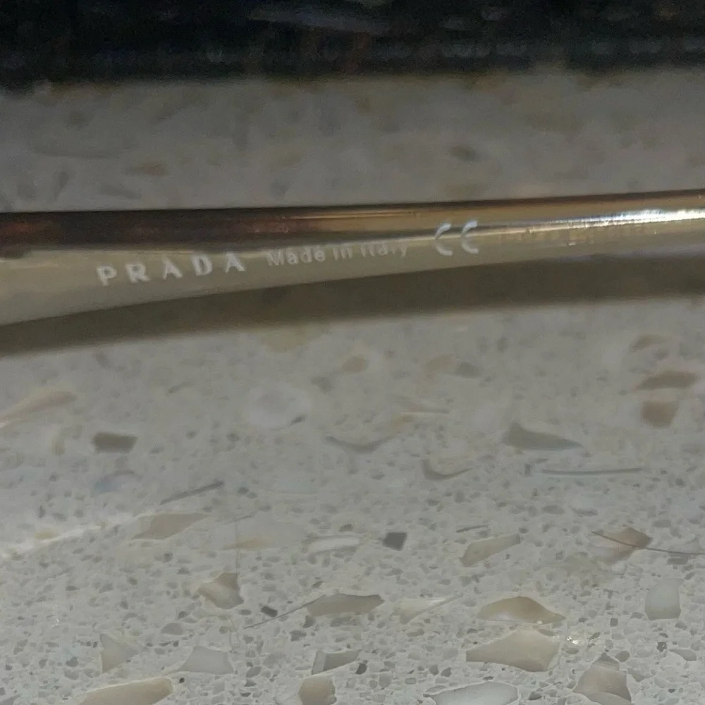 Prada Brown Gradient Eyeglasses VPR53H